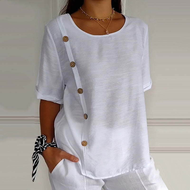 Women's blouse with round neckline and buttons on the side